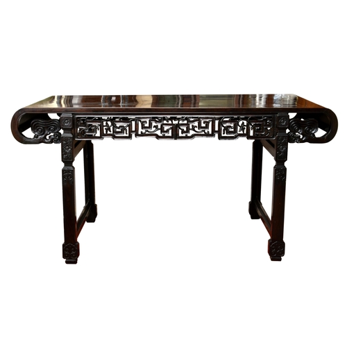 1494 - A large 19th century Chinese dark hardwood altar table, probably zitan, the rectangular cleated top ... 