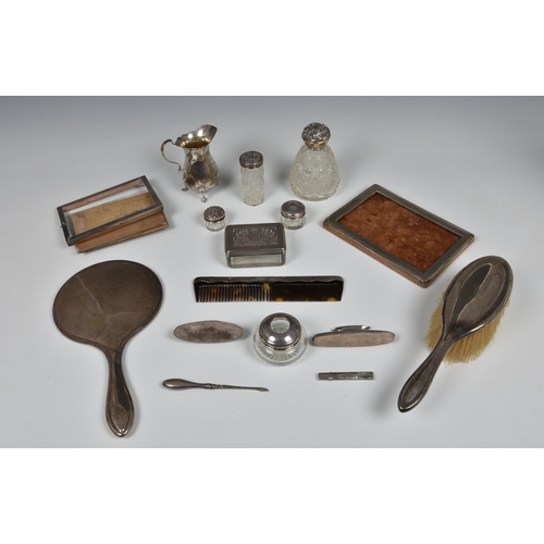 179 - A collection of various silver collectables, to include a Georgian rectangular glass toilet jar with... 