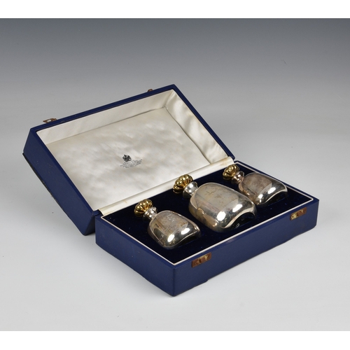 139 - A cased set of three Elizabeth II Silver Jubilee scent / perfume bottles by Asprey, London, 1977, ea... 