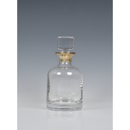 171 - A boxed Elizabeth II glass decanter with silver collar, W I Broadway & Co, Birmingham, 1998, of mall... 