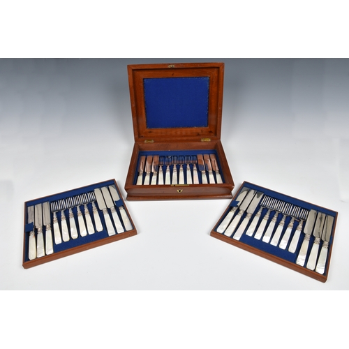 175 - A mahogany cased set of mother of pearl handled silver plated knives and forks for eighteen settings... 