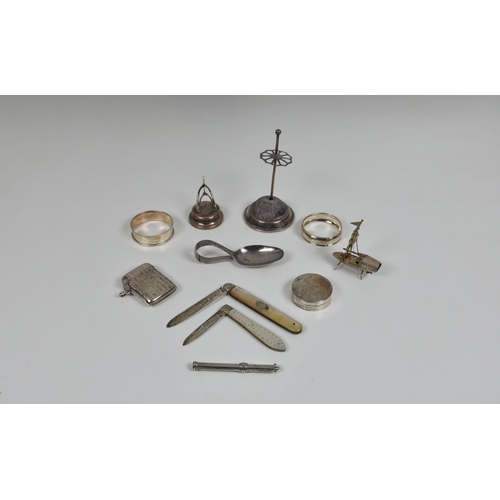 177 - A small collection of collectable silver, to include a novelty wishbone place card holder by Marks &... 