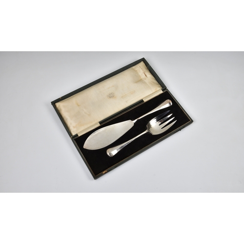 185 - A cased set of George V silver fish servers, Harrison Brothers & Howson, Sheffield, 1923, the knife ... 