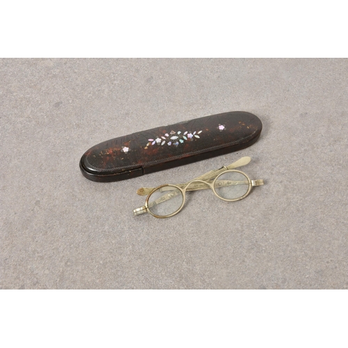 249 - A pair of Georgian silver spectacles, silver lion mark and other indistinct marks, housed in faux to... 