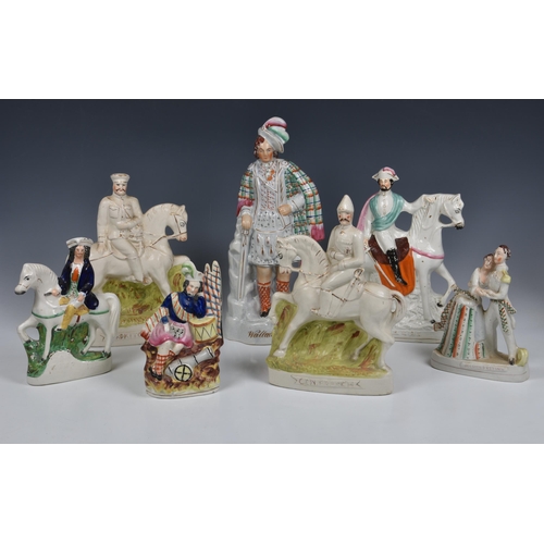 53 - A collection of 19th century and later Staffordshire mostly Military related flatback figures, to in... 