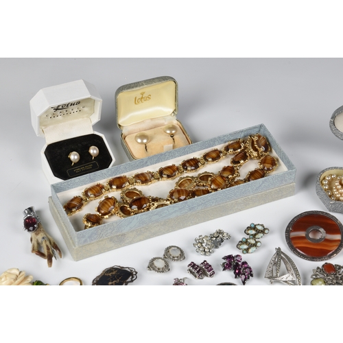 1141 - A collection of silver, marcasite and costume jewellery, mostly mid-century and vintage, together wi... 