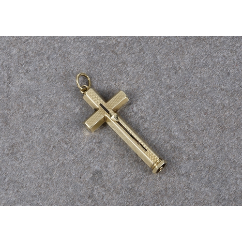 1034 - A 9ct gold novelty propelling pencil, in the form of an engine turned cross pendant, no hallmarks, t... 