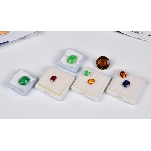 1050 - A small collection of loose, unmounted gemstones, including a 3.01ct emerald, of medium light colour... 