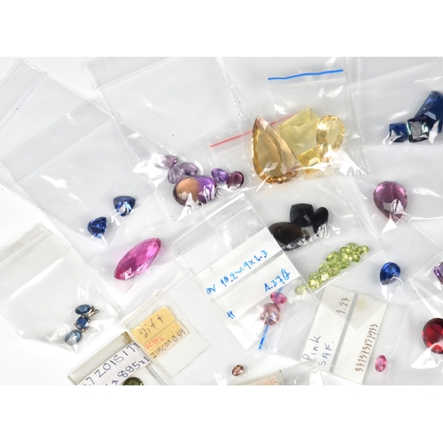 1051 - A large collection of loose, unmounted gemstones, no certificates or paperwork, including pink sapph... 