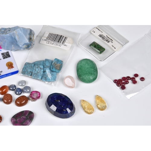 1053 - A collection of cut and uncut gemstones, including an approx. 158.5ct red beryl rough stone with AGI... 