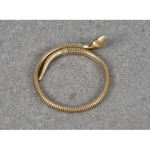 1057 - A mid-century 9ct gold and ruby flexible snake bracelet, hallmarked Chester 1957, the head with chas... 