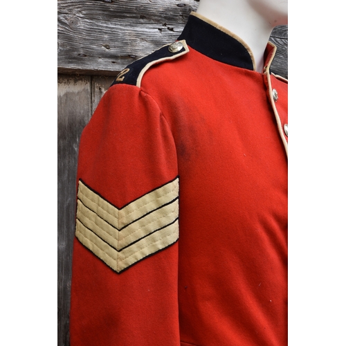 1828 - A Guernsey Militia scarlet tunic, for a Sergeant of the North regiment, eight silvered buttons to fr... 