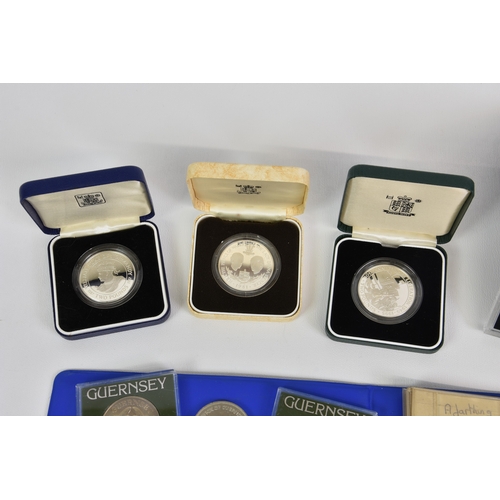 1905 - A collection of Guernsey silver proof and other commemorative coins etc, to include two pound to com... 