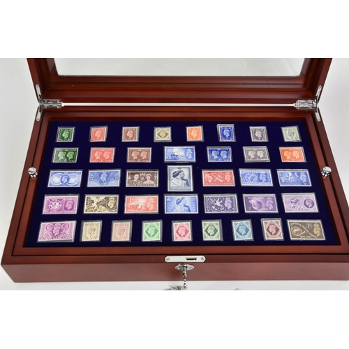 1922 - Danbury Mint - The George VI Stamp Collection, stamps from the reign of George VI, including every c... 