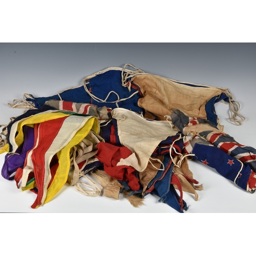 2031 - Six 1940s strings of linen bunting / flags, to include three strings with ensigns / flags, Scottish,... 