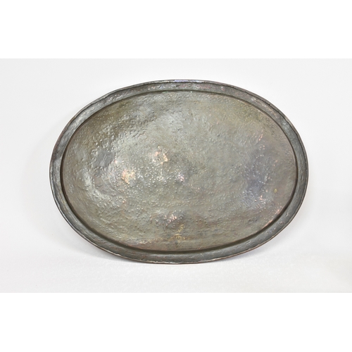 2126 - A 19th century Middle Eastern / Persian oval copper tray, with stylised foliate scroll decoration, 1... 