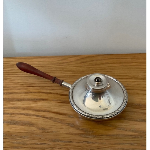 32 - A novelty silver Elizabeth II silver table lighter, fashioned as a saucepan or bed pan with turned h... 