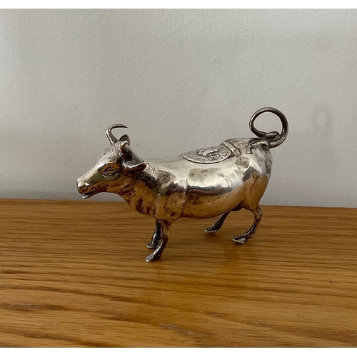 34 - An Edwardian novelty silver naturalistic cow creamer, German, Hanau, Neresheimer and Sons, hallmarke... 