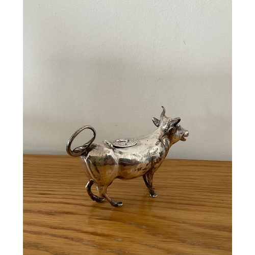 34 - An Edwardian novelty silver naturalistic cow creamer, German, Hanau, Neresheimer and Sons, hallmarke... 