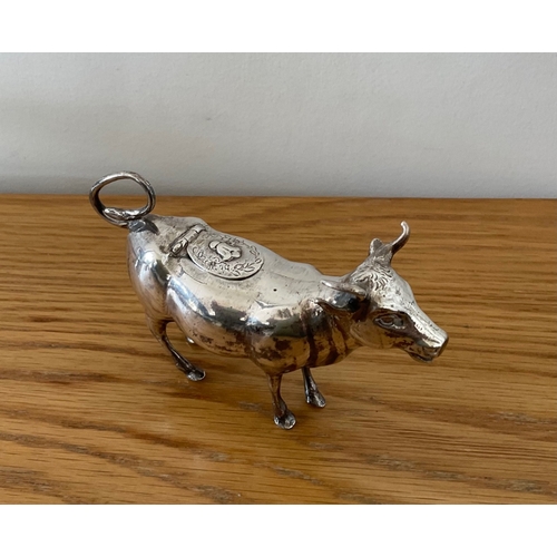 34 - An Edwardian novelty silver naturalistic cow creamer, German, Hanau, Neresheimer and Sons, hallmarke... 