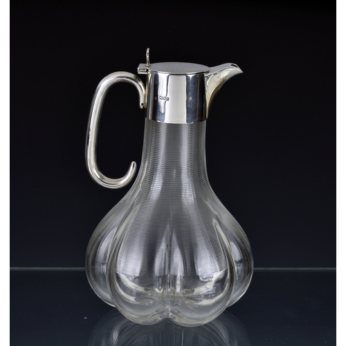 4 - An elegant and unusual late Victorian silver mounted claret jug, William Hutton & Sons Ltd, London 1... 