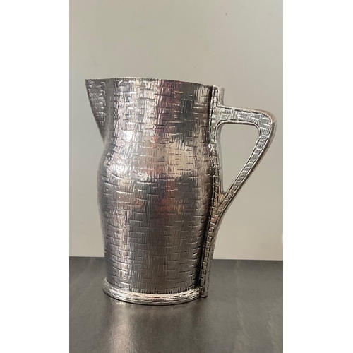 68 - An extremely rare Victorian novelty silver cream jug, Edward Hutton, London 1887, modelled as a leat... 