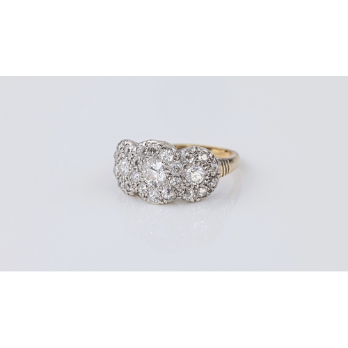 818 - An antique 18ct gold, silver and diamond triple cluster ring, each cluster with a central old brilli... 