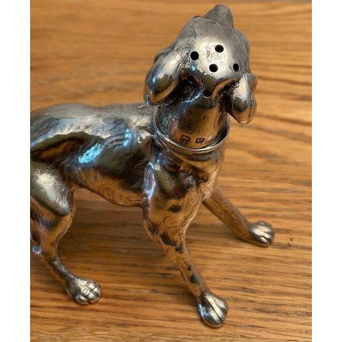 92 - A large George V novelty silver dog pepper pot, Elkington & Co, Birmingham, 1913, modelled in a play... 