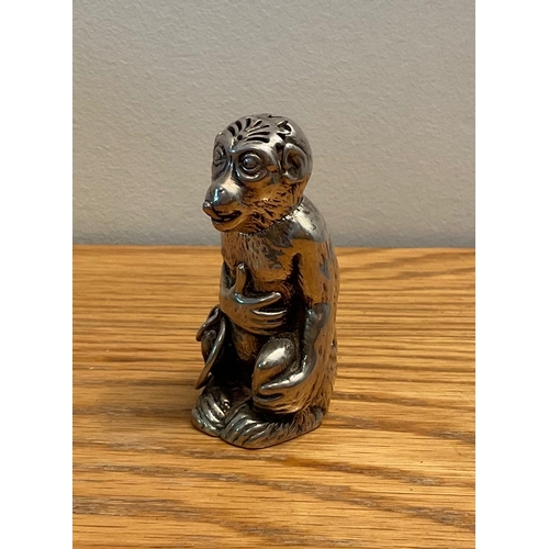 93 - An extremely rare novelty Victorian silver pepper caster in the form of a seated monkey, Makers mar... 