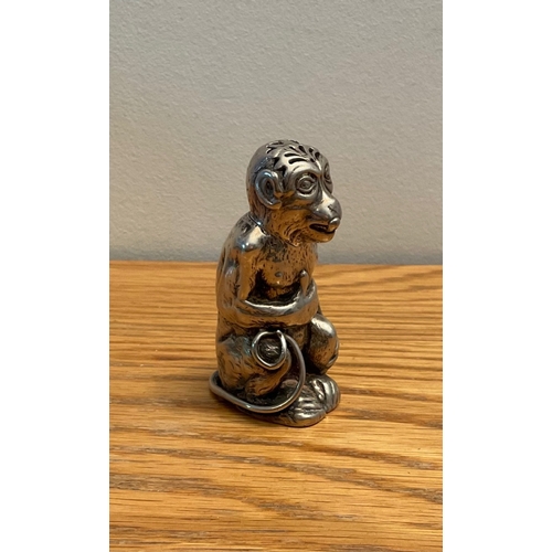 93 - An extremely rare novelty Victorian silver pepper caster in the form of a seated monkey, Makers mar... 