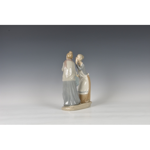 102 - A large Lladro figurine 'The Gossip', two ladies modelled standing, printed and stamped marks, 12in.... 