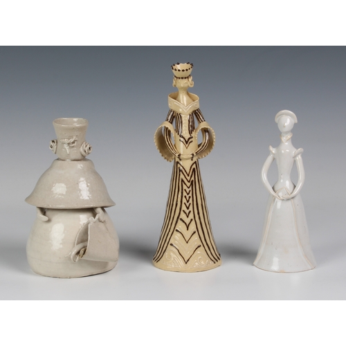 108 - Three mid 20th century comical figures by Marion Morris, the tall female figure in a sand glaze, sig... 