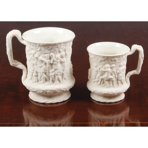 109 - Charles Meigh - two white porcelain tankards with vine handles	, 19th century, bisque glaze to ex... 