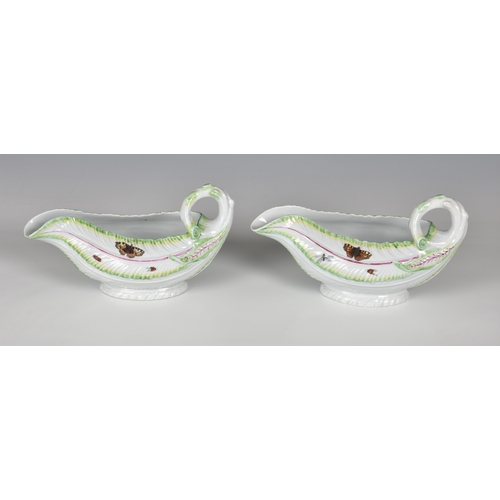 113 - A pair of Worcester porcelain lettuce leaf sauce boats, probably first period, with moulded leaf tex... 