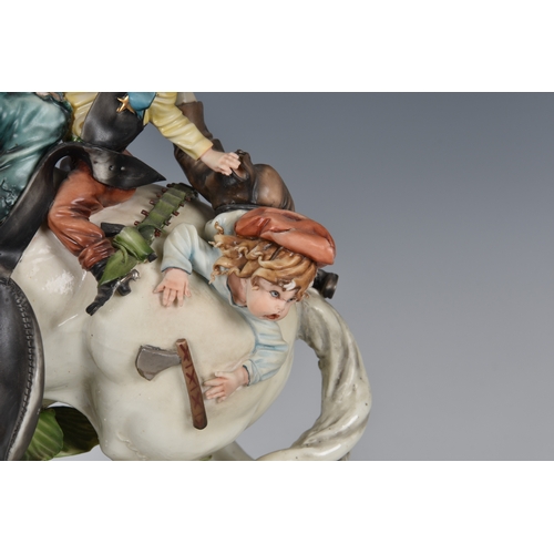 114 - A Capodimonte porcelain group of children on horseback, titled 'Far West', by Tiziano Galli, 14½in. ... 