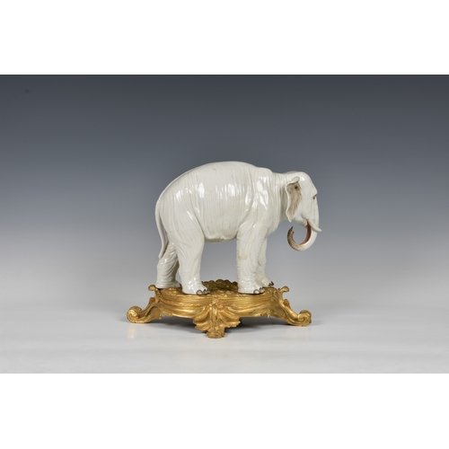 12 - An ormolu mounted Sampson white porcelain elephant , after Meissen, 19th century, realistic features... 