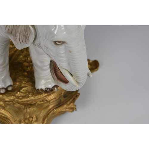 12 - An ormolu mounted Sampson white porcelain elephant , after Meissen, 19th century, realistic features... 