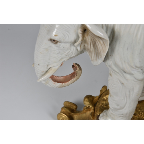 12 - An ormolu mounted Sampson white porcelain elephant , after Meissen, 19th century, realistic features... 