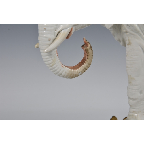 12 - An ormolu mounted Sampson white porcelain elephant , after Meissen, 19th century, realistic features... 