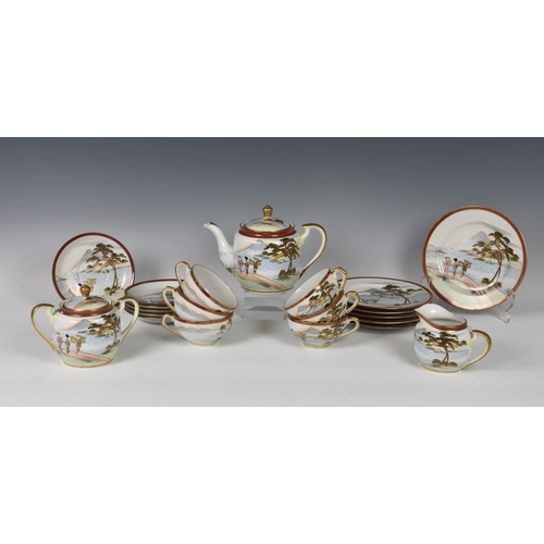 1249 - A Japanese eggshell porcelain tea service, mid-20th century, comprising a teapot, cream jug, twin ha... 