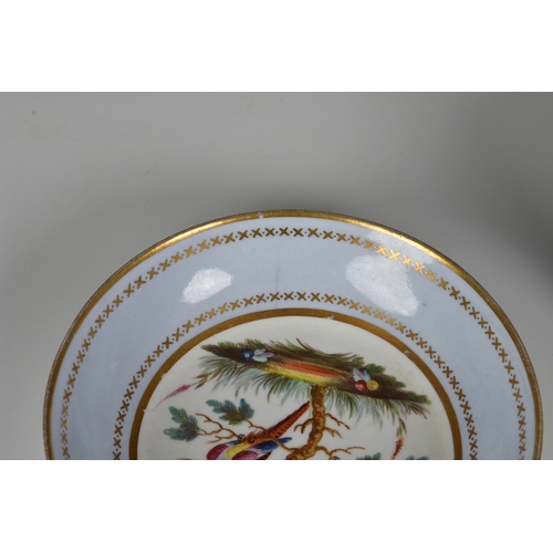 18 - A Spode porcelain coffee can and saucer, early 19th century, with painted reserves of exotic birds, ... 