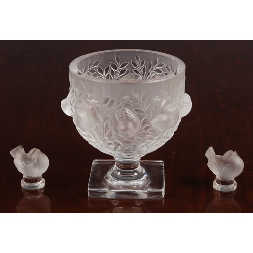 180 - A Lalique frosted glass goblet form vase with a band of raised sparrows among foliage, Created in 19... 