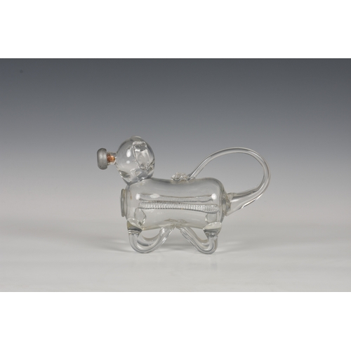 183 - A late 19th century novelty glass decanter fashioned as a dog, his tail forming the handle and nozzl... 