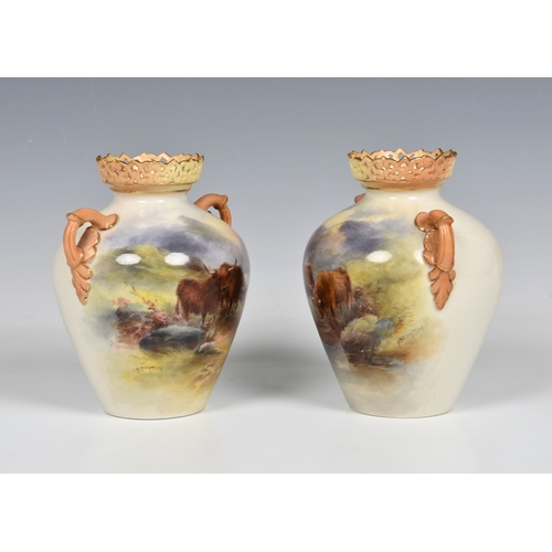 4 - A pair of Royal Worcester porcelain highland cattle painted twin handled vases by Harry Stinton, one... 