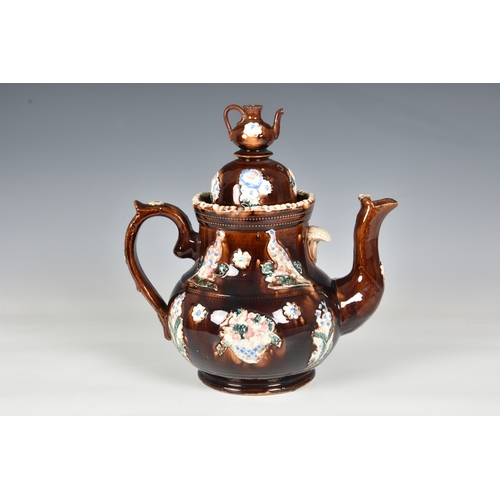 50 - A Victorian barge ware teapot, inscribed "Think of Me", the stoneware body with typical tr... 