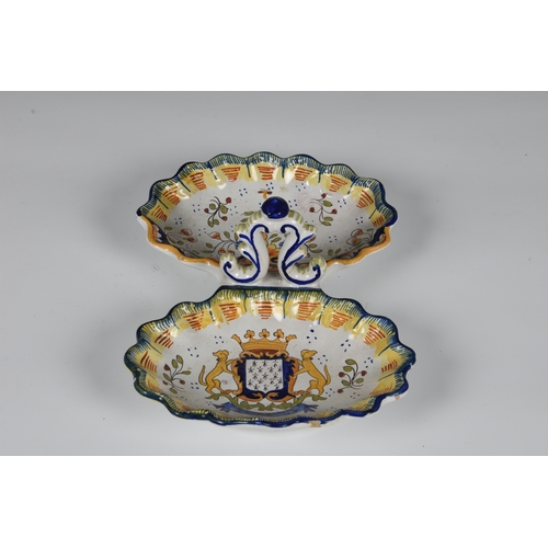 71 - A late 19th century St Malo faience two section crudité dish, with a scalloped edge, painted with th... 