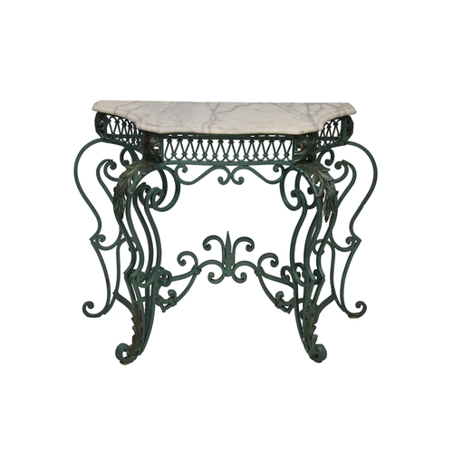 769 - A serpentine wrought iron console table with white marble top, the scrolled base with applied acanth... 