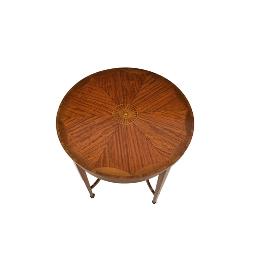 795 - A fine Edwardian mahogany and silkwood crossbanded occasional table, the circular top with central r... 