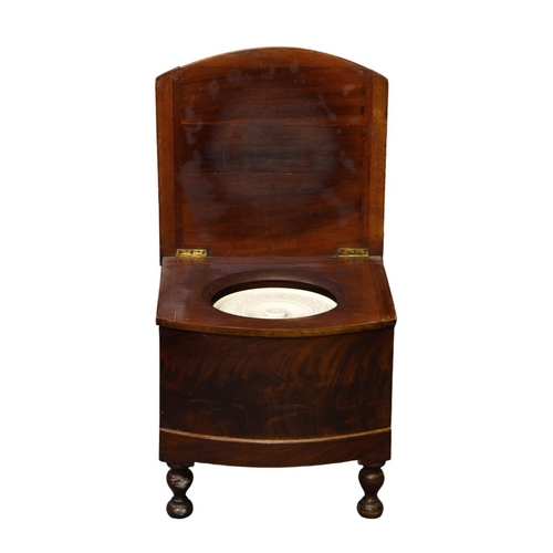 801 - A Victorian mahogany bowfront step commode, with china lidded potty and pull-out lower drawer with i... 