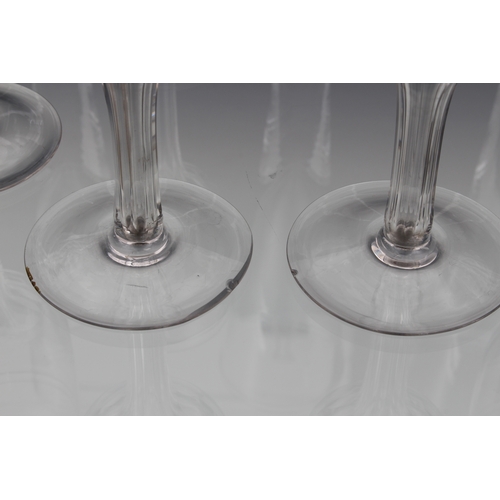 147 - A set of five unusual oversized blown glass champagne flutes, probably third quarter 20th century, o... 